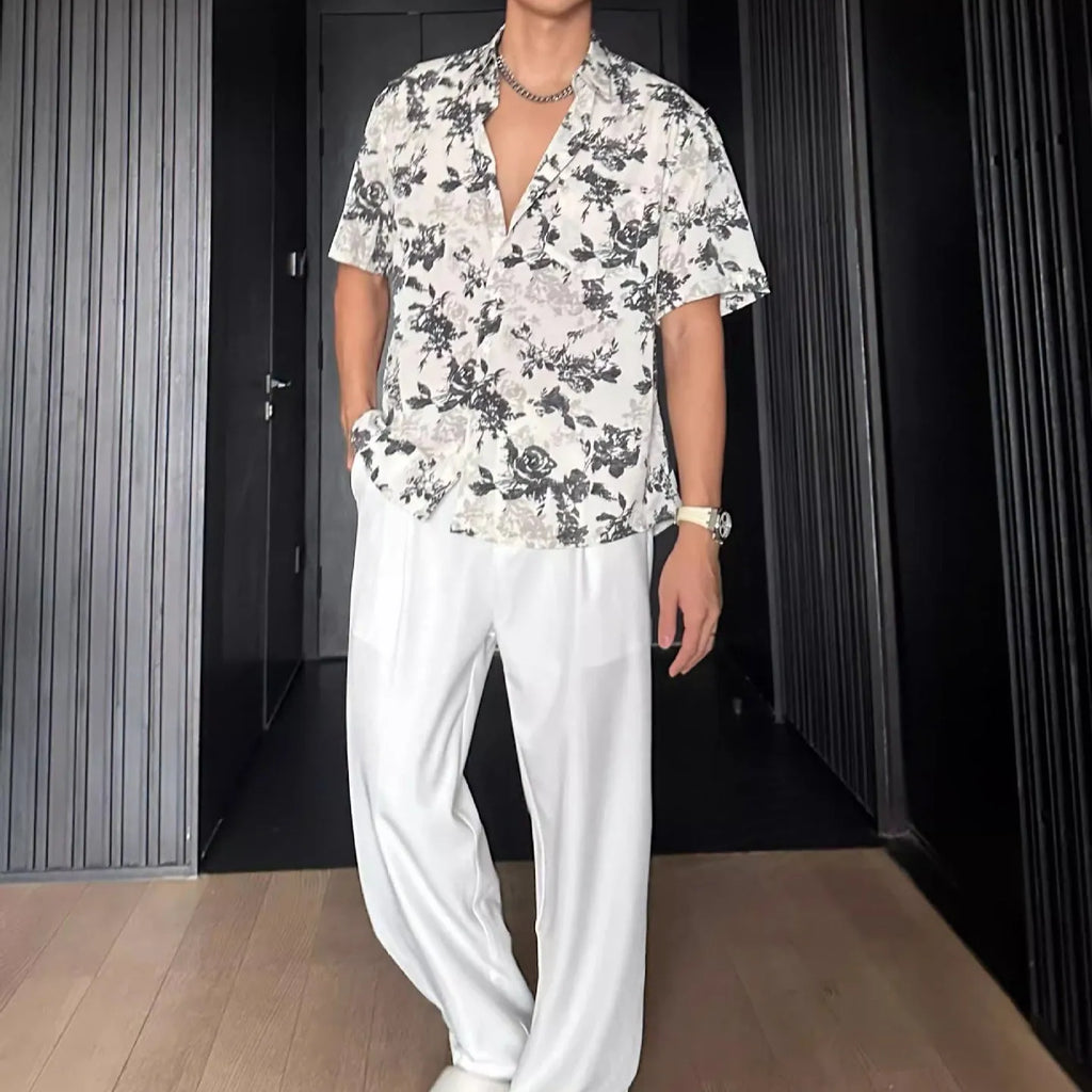 Loose-fitting printed casual shirt with floral pattern and short sleeves in black or white