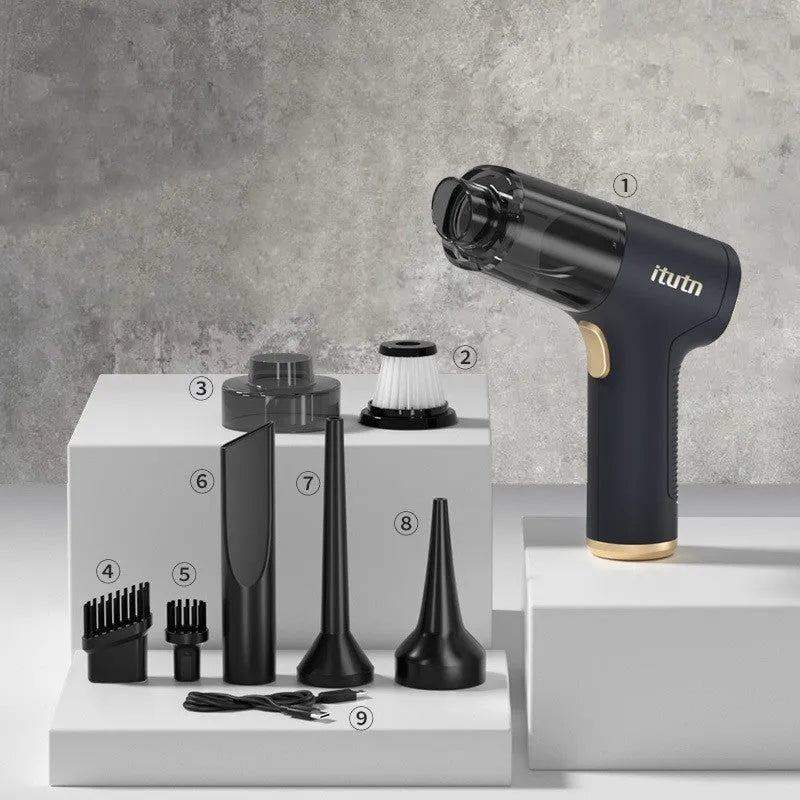 Black wireless handheld car vacuum cleaner with multiple nozzles on a black background