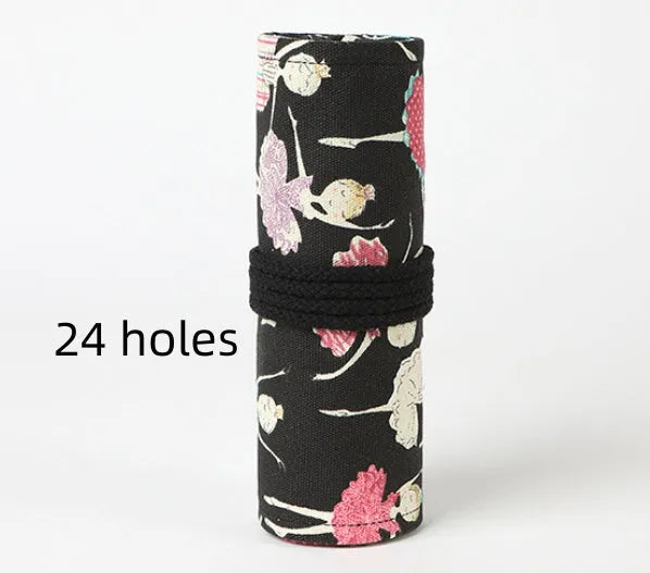 Square canvas rolling pencil case with ballet girl print, showing multiple holes for pencils.