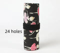 Square canvas rolling pencil case with ballet girl print, showing multiple holes for pencils.