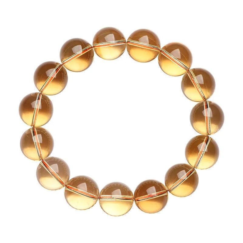 Natural citrine scattered bead bracelet showing original design with polished beads in varying arrangements