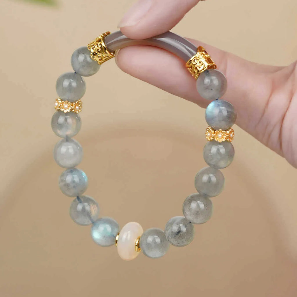 Light green Tian Shan Cui jade women's half bracelet with floating flower girl design in Chinese folk style.