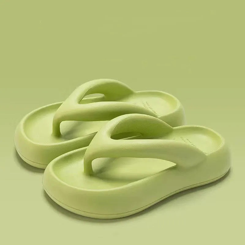 Solid colour thick-soled EVA flip-flops with a decorative bow on the strap