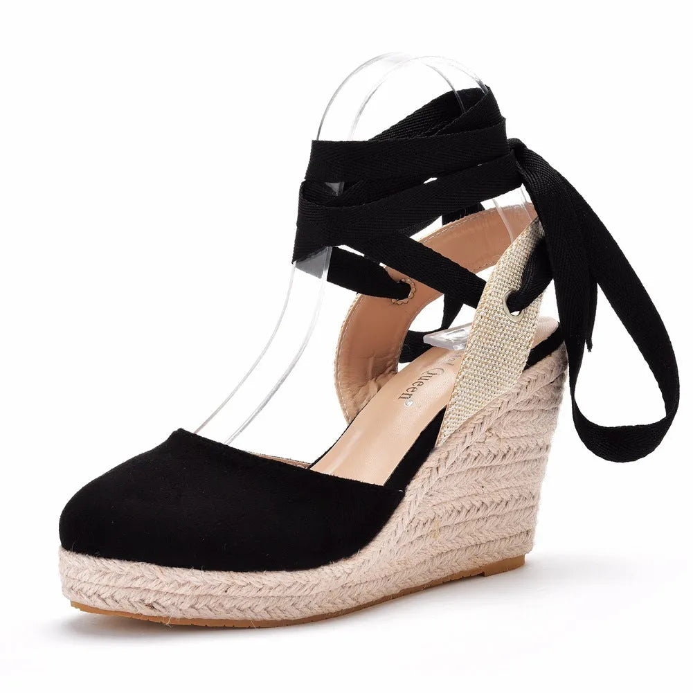 Women's apricot bohemian wedge sandals with beaded tassel detail on embossed strap.