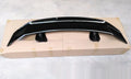 A bright black punch-free ABS plastic tail wing spoiler for cars.