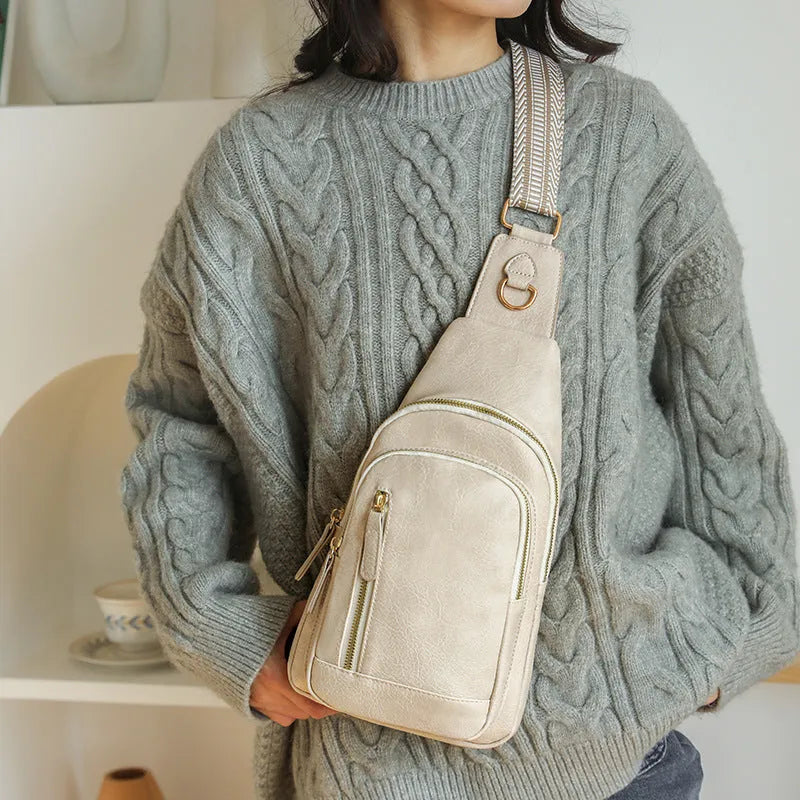 Small brown soft PU women's messenger crossbody bag with an open front pocket and decorative stitching.