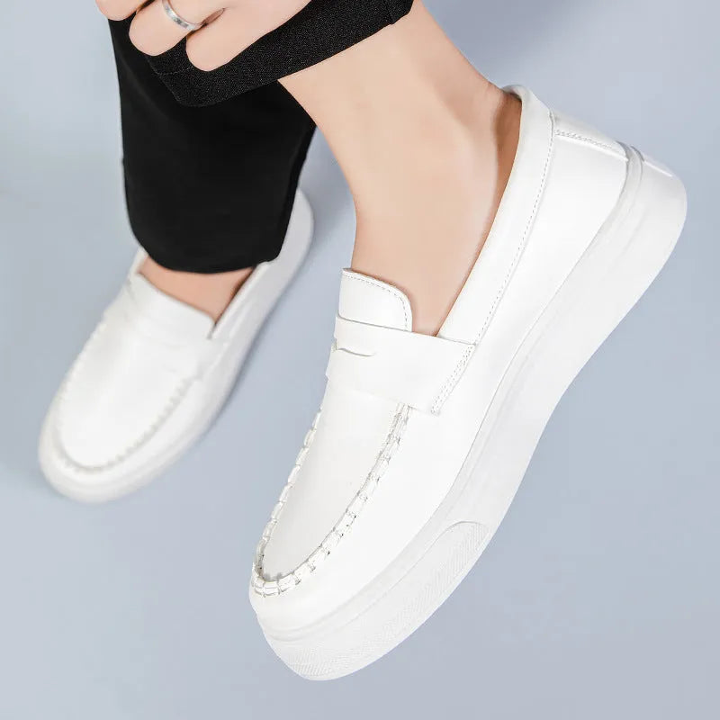 PU artificial leather slip-on casual shoes in white, shown in a side view on a neutral background.