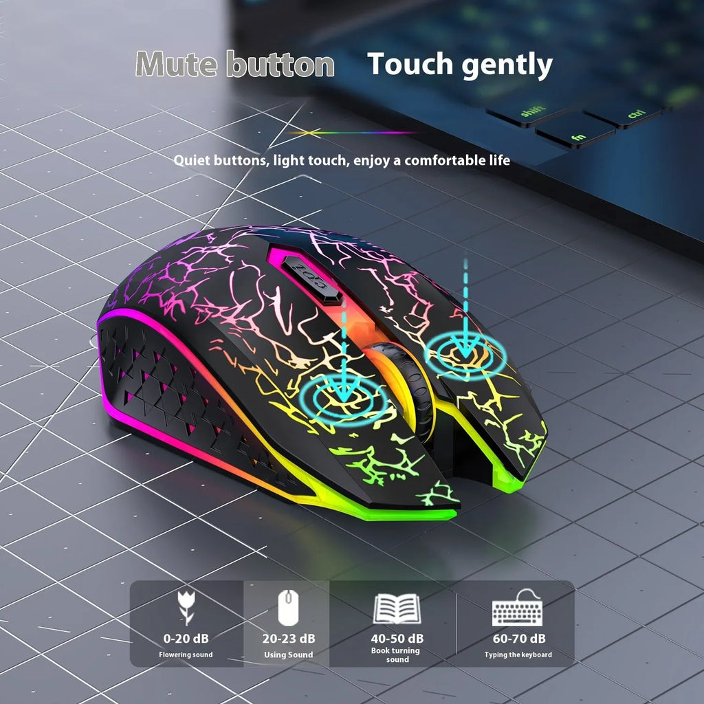 Black and white wireless gaming mouse with breathing lights and USB charging cable on desktop
