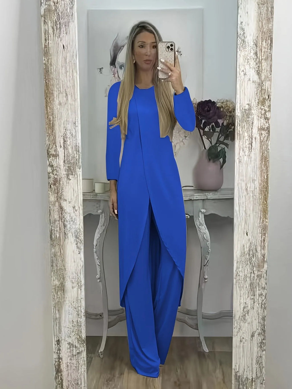 Casual black polyester two-piece tracksuit set with long sleeves and loose-fit trousers.