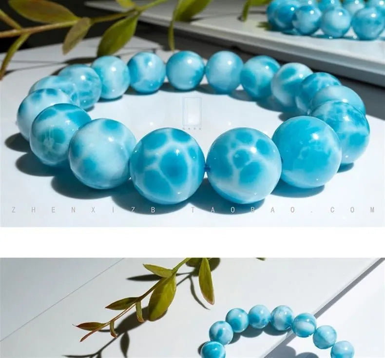 Blue bodhi bracelet with sea-pattern crystal stone and pearl accents in Maillard style.