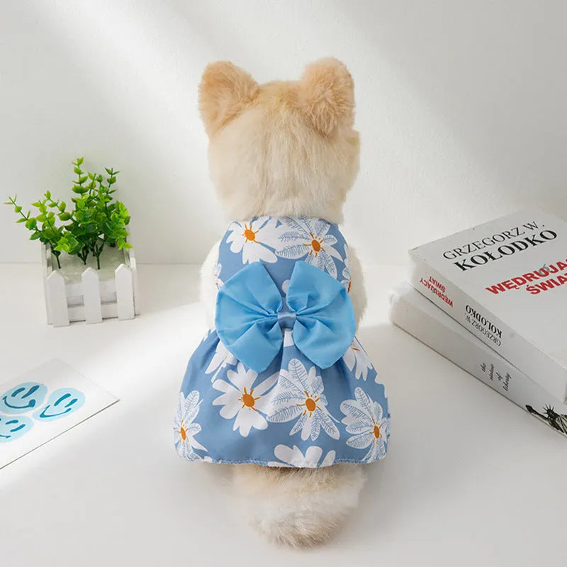 Orange floral butterfly pet dress with decorative bow knot on dog model