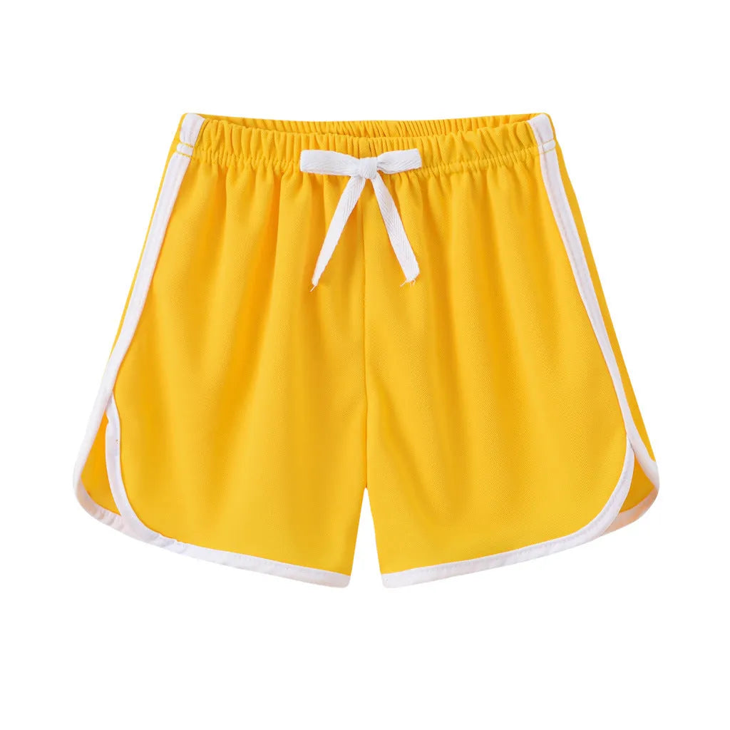 Children's casual polyester shorts in a selection of colours and patterns including stripes and fruit prints.