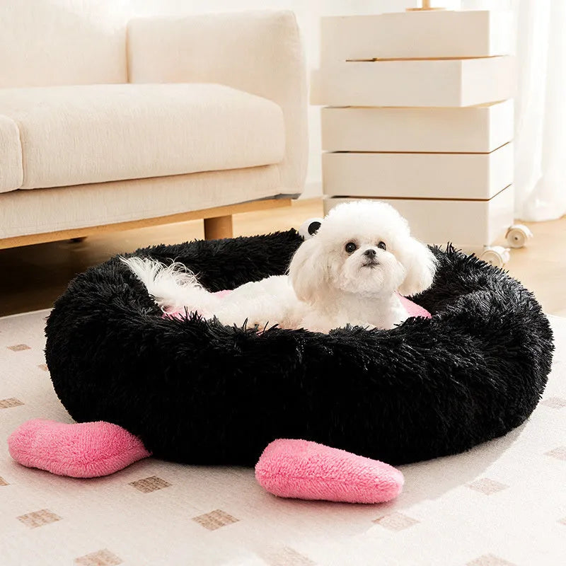 Elf Briquettes blue plush kennel-style dog bed mat with raised edges.