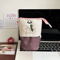 Korean-style Oxford fabric pencil case measuring 17cm by 14cm in brown or green colours
