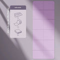 Folded and unfolded thick purple TPE gymnastic mat showing its non-slip surface and dimensions.