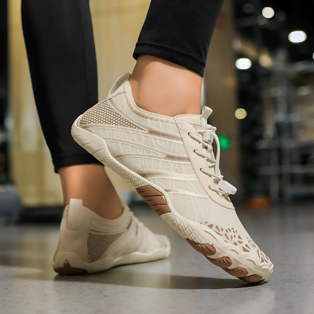 Beach running shoes in stretch Lycra fabric, shown in beige colour.