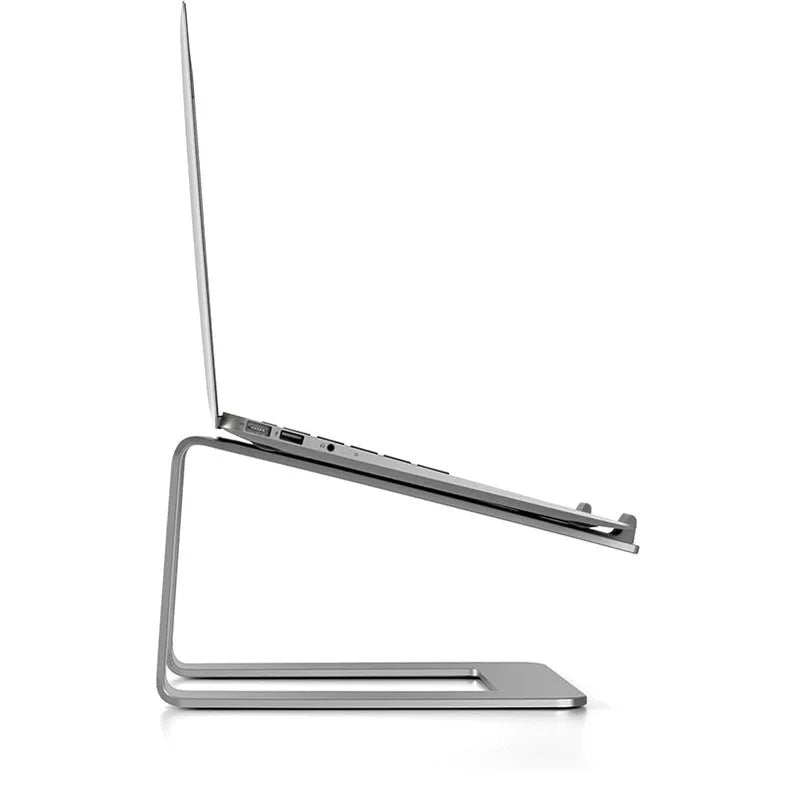 Black aluminium alloy laptop stand on a desk, showing its size and solid base plate.