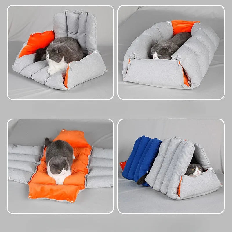 Blue triangular cat bed with drilled holes on a sofa, showing removable cotton cover.