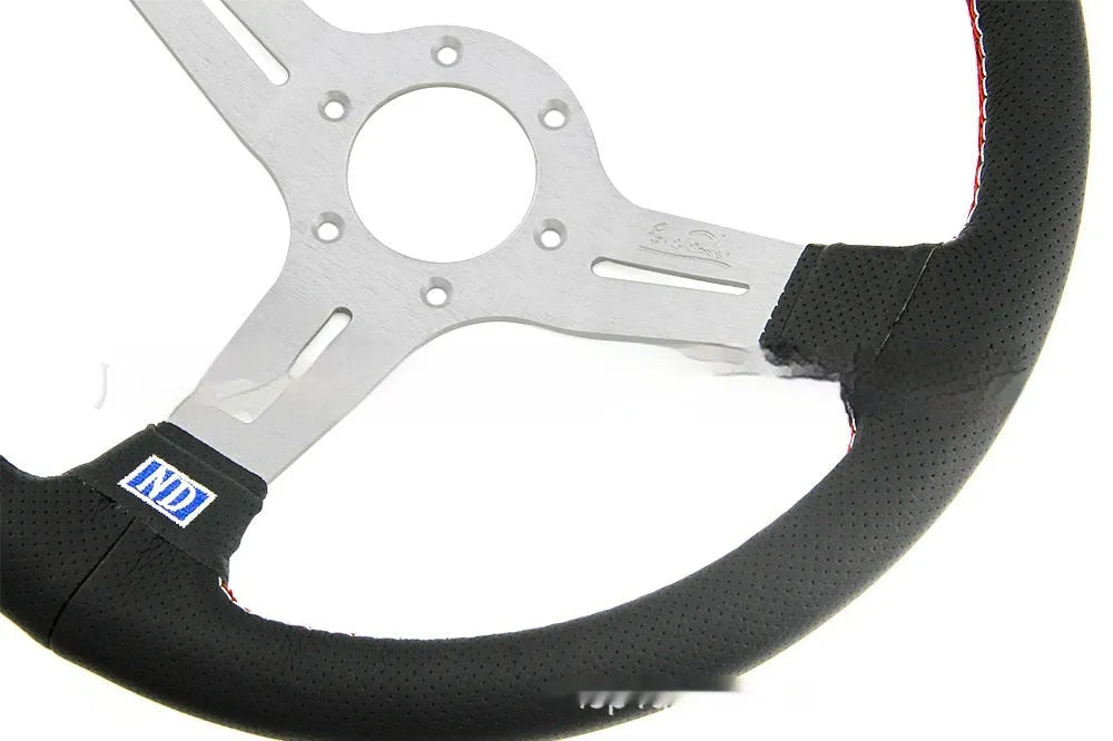 14-inch leather steering wheel with concave middle section and silver-black colour scheme