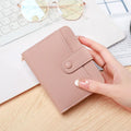 Women's lychee pattern PU leather short wallet showing card slots and cash compartment