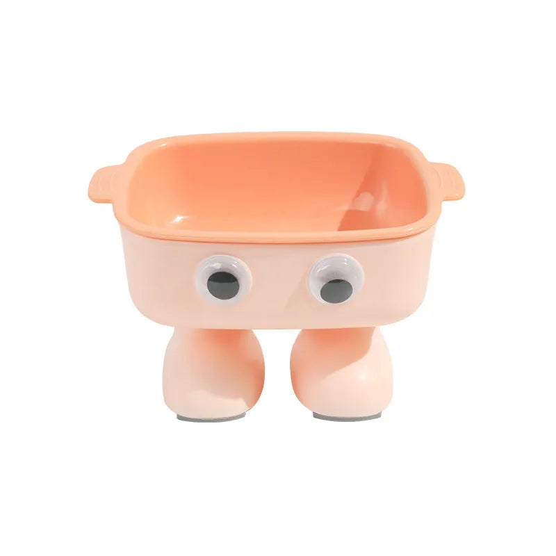 Green cartoon robot shaped elevated cat bowl with tilted food dish on anti-slip base