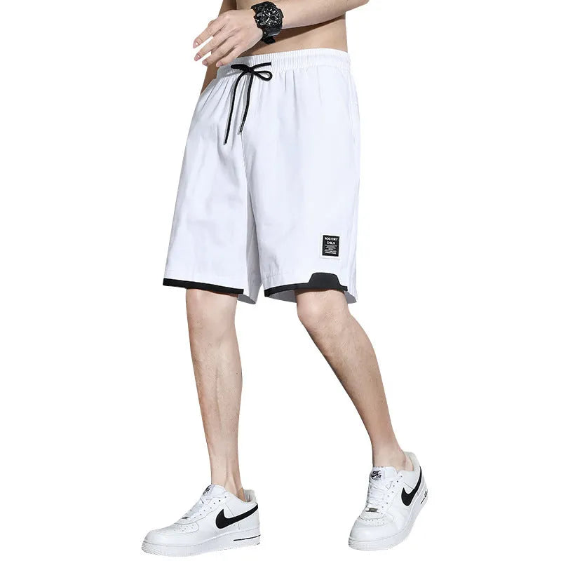 Boys cotton shorts in black, khaki and white colours showing mid waist design and shorts length