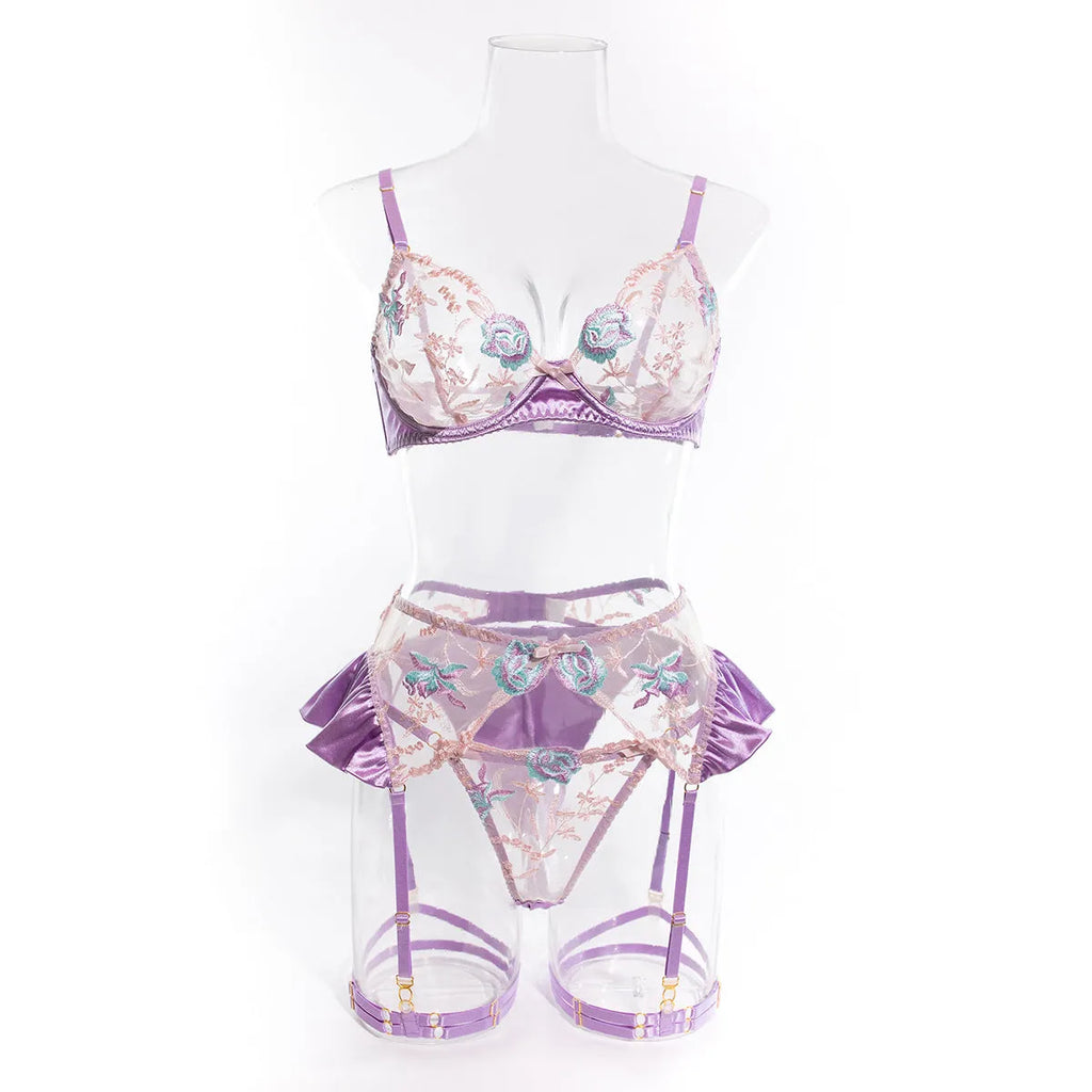 Light purple satin four-piece lingerie set with embroidery detailing