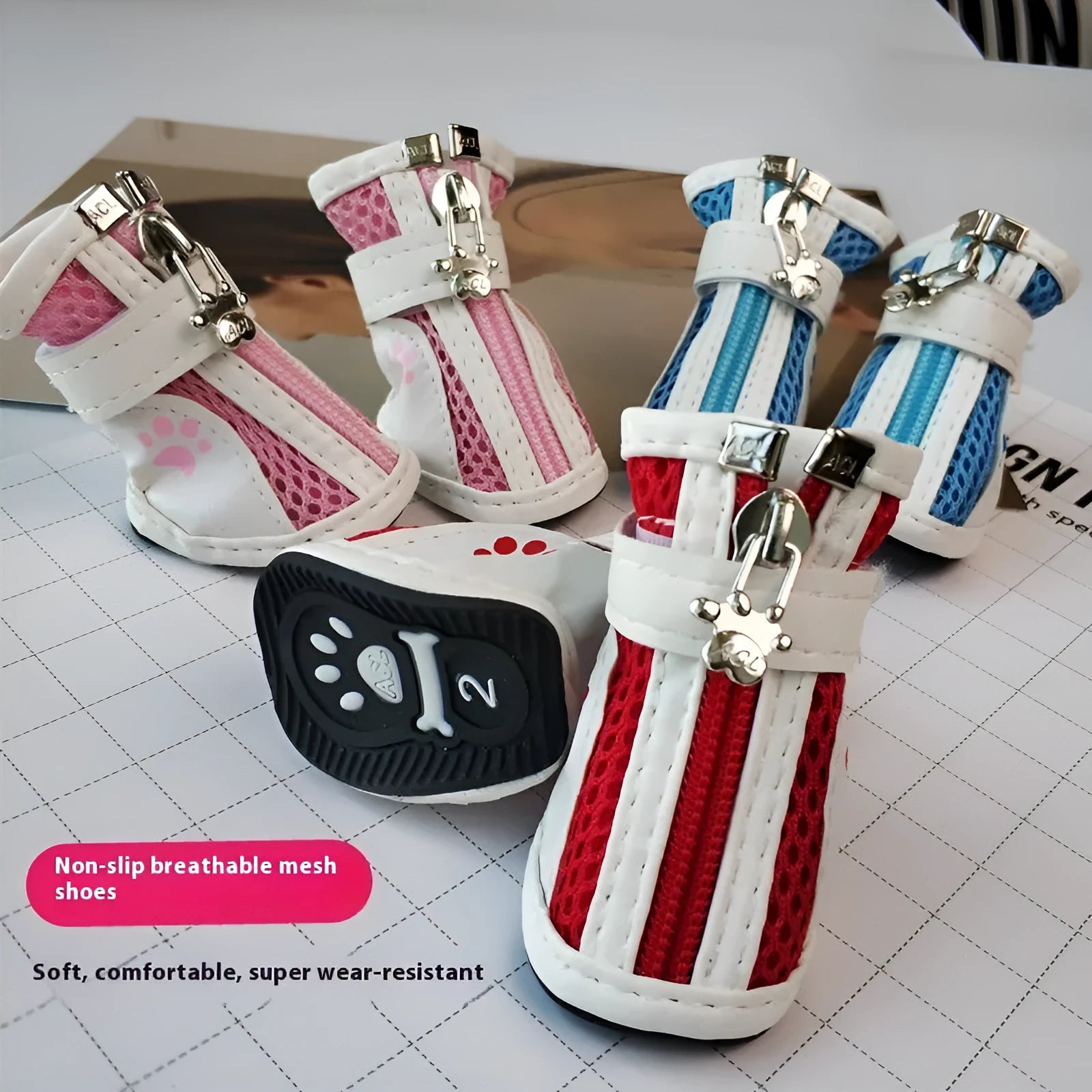 Blue zipper dog shoes with non-slip soles for small dogs, shown alongside pink and red colour options.