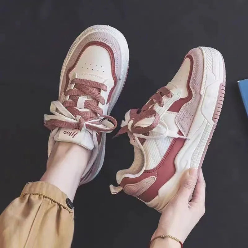 Women's pink and beige low-top height increasing sneakers with rubber soles