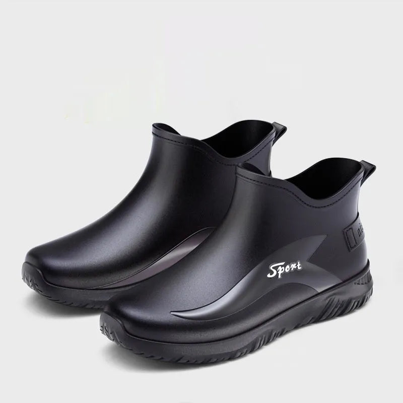 Men's short PVC rubber boots in beige, black, and black & red colours on a flat heel