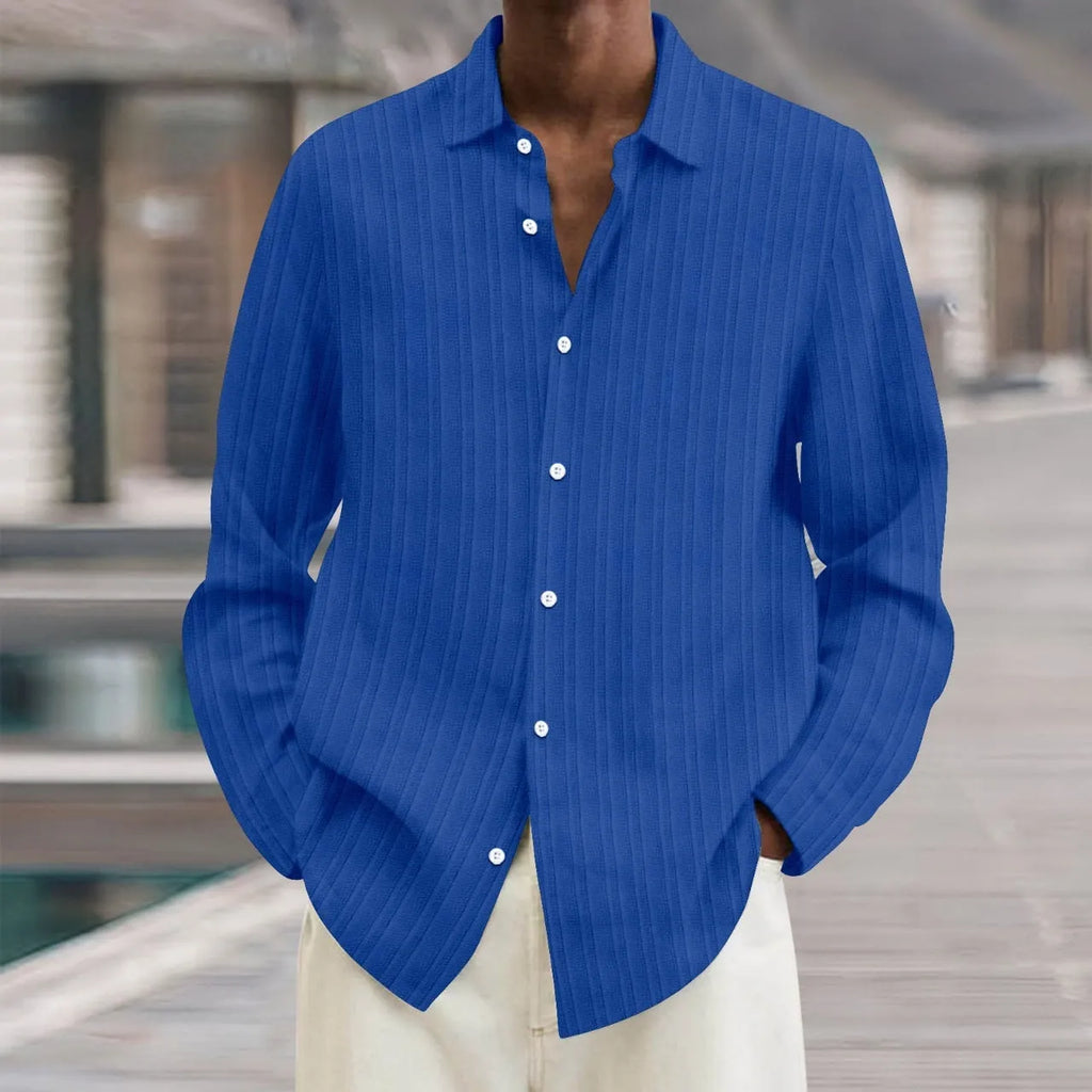British-style loose fit men's striped long sleeve cardigan shirt on a hanger.