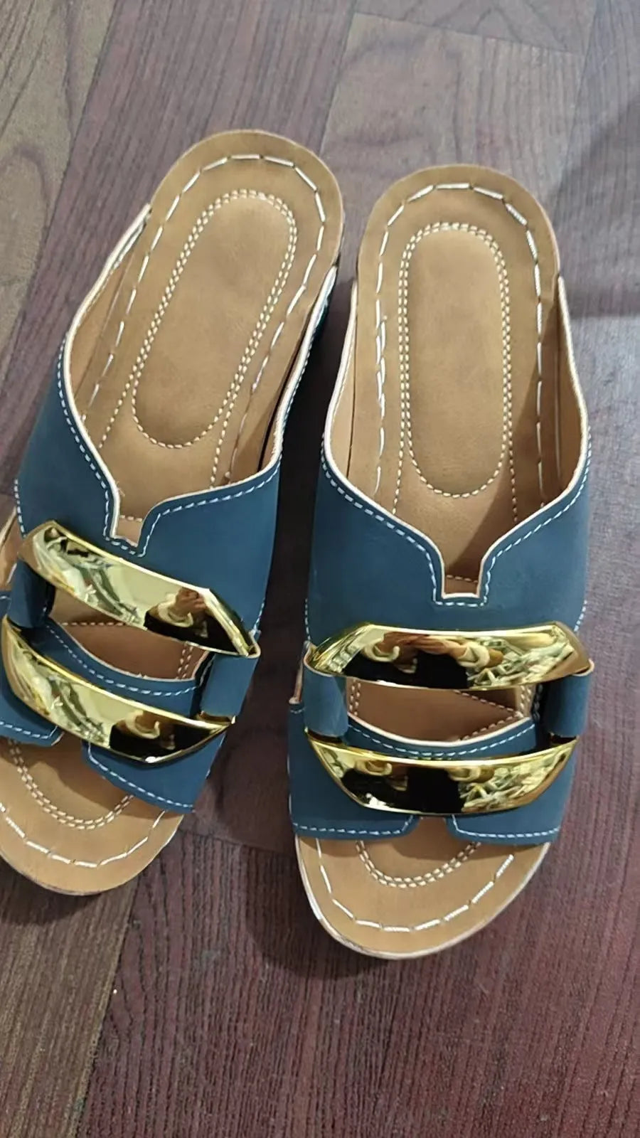 Women's Roman style platform sandals in white, black, khaki, and blue with a metal detail.