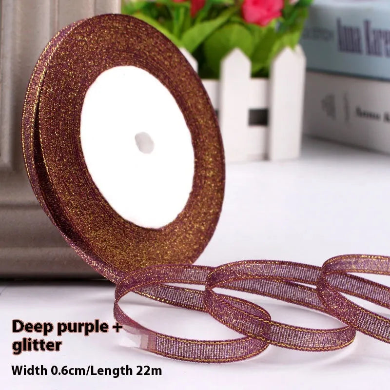 Roll of polyester gift packaging ribbon with 0.6cm width and 22 metre length in various colour options