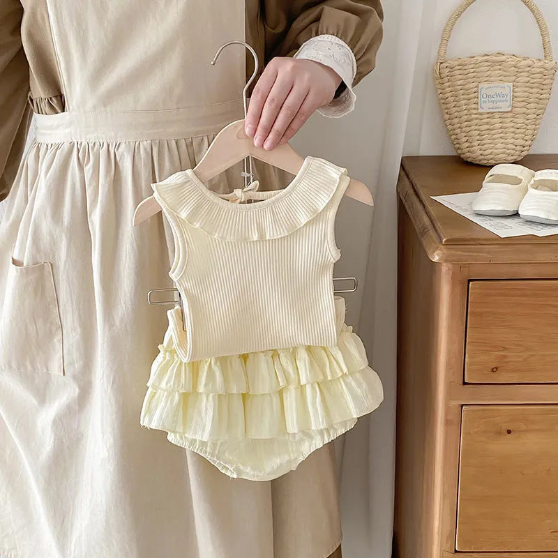 Girls' beige cotton summer set with sleeveless ruffled collar top and double layer Bud-waisted shorts