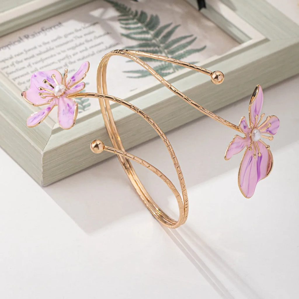 Pink alloy armband jewellery with hollow pattern design lines for fashion wrist accessory