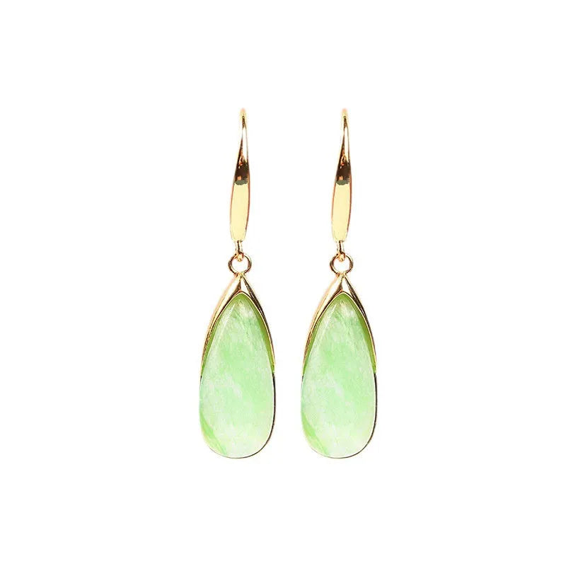 A pair of jade-coloured geometric copper earrings with a water drop element in a Chinese style.