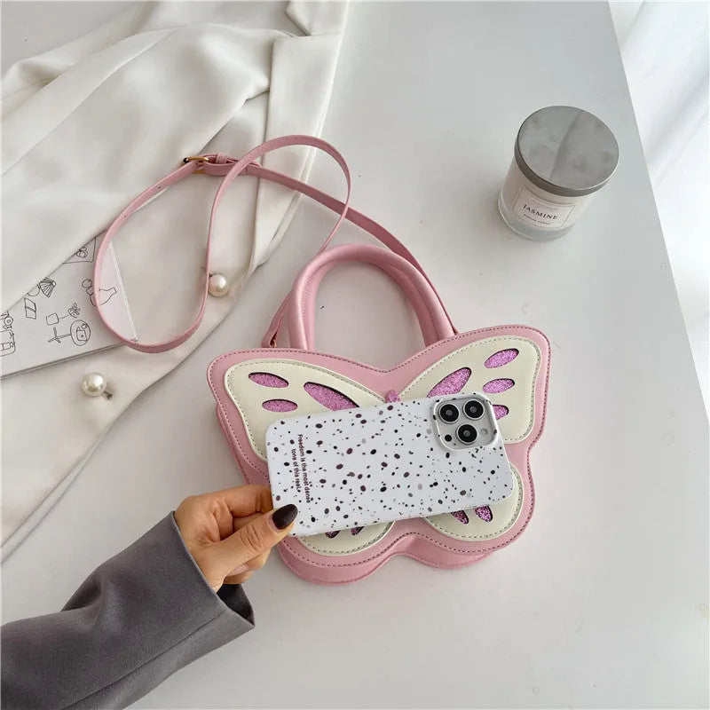 Square PU leather crossbody bag with contrasting colour elements showing dimensions 27cm by 14cm
