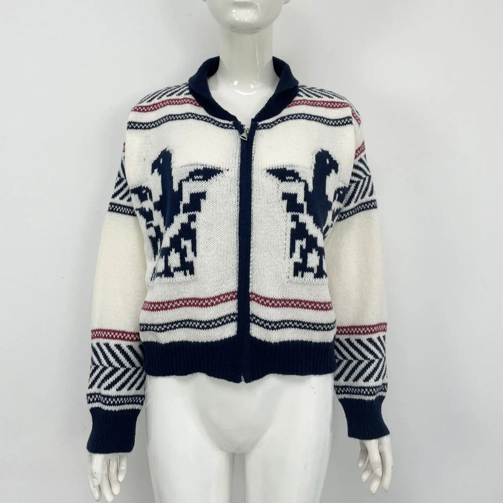White women's cardigan sweater with a front zipper, lapel collar, and a vertical jacquard contrast stripe.
