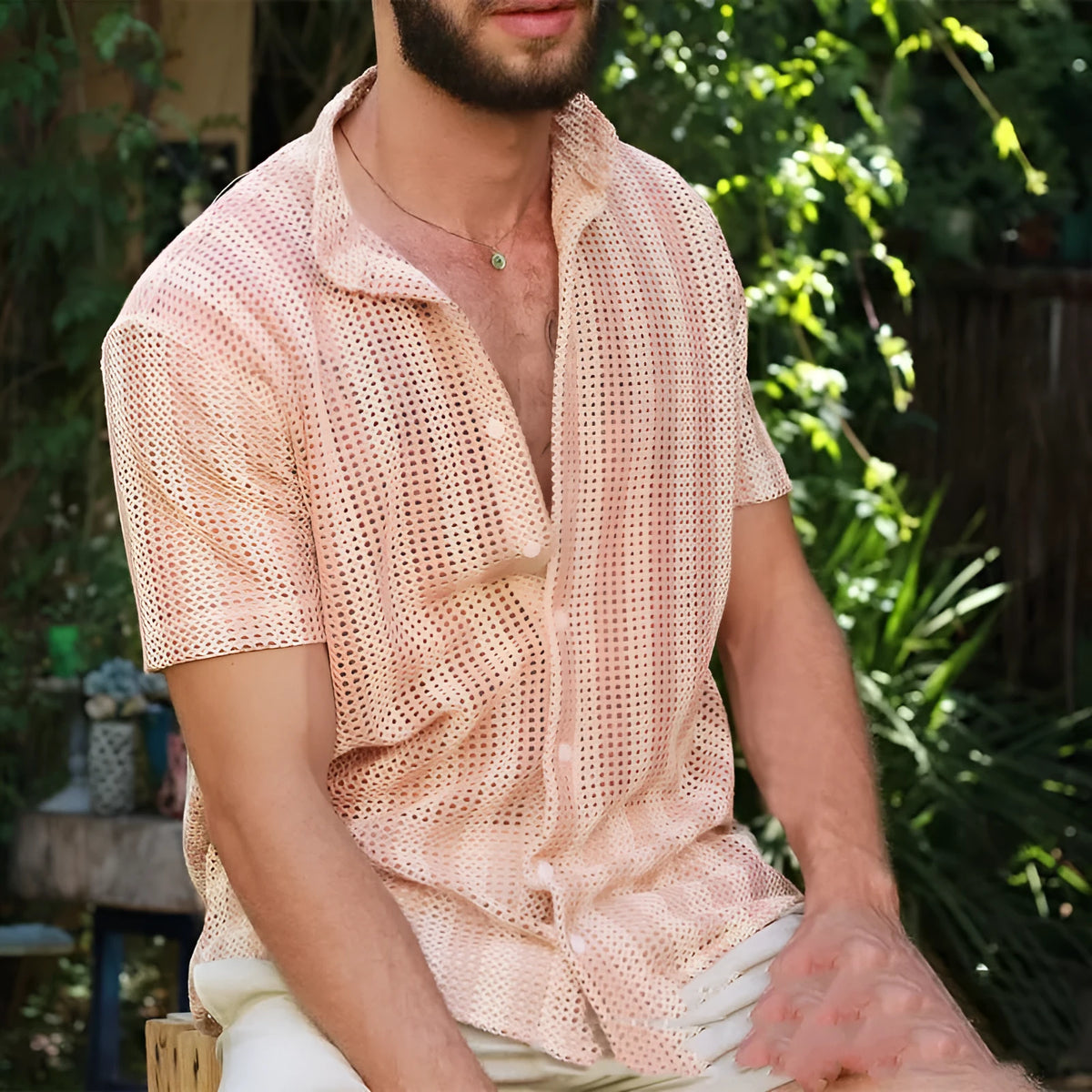 Pink men's casual shirt with waffle texture fabric and short sleeves in loose cardigan style