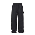 Black baggy paratrooper trousers with elastic drawstring waist and three-dimensional cutting