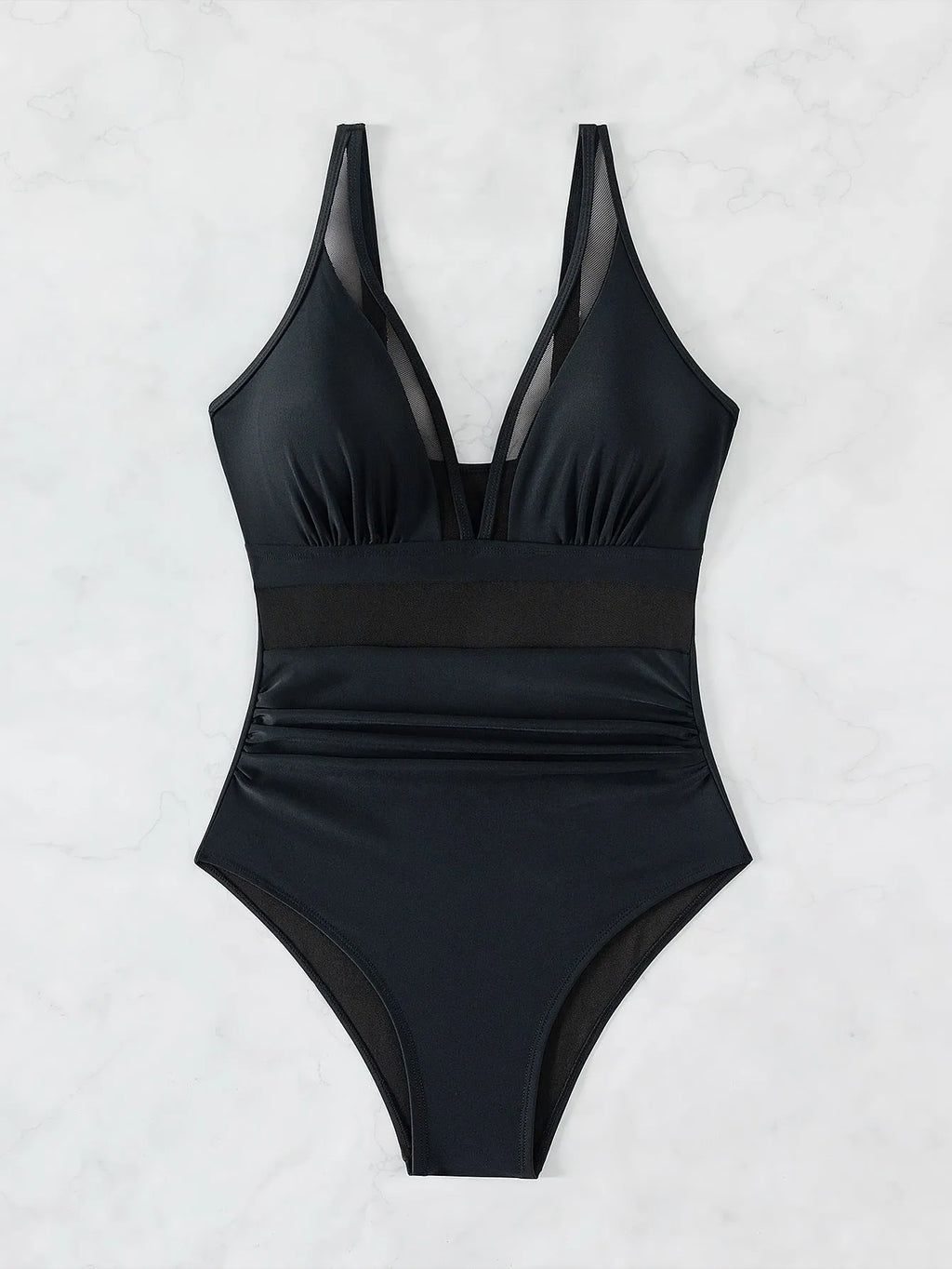 Black women's one-piece halter swimsuit with mesh detailing and attached briefs, shown on a size chart.