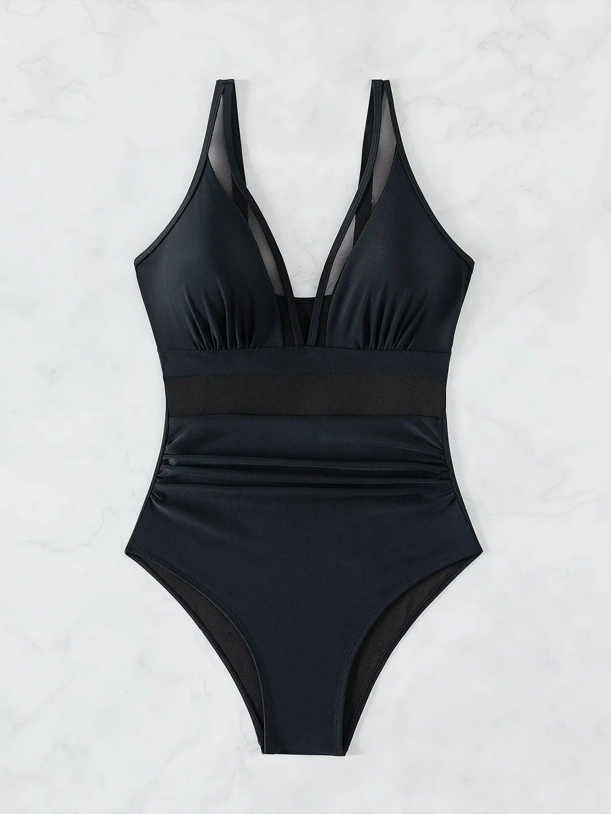 Black women's one-piece halter swimsuit with mesh detailing and attached briefs, shown on a size chart.