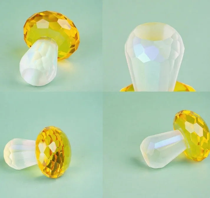 Colourful geometric crystal mushroom decoration on a white background.