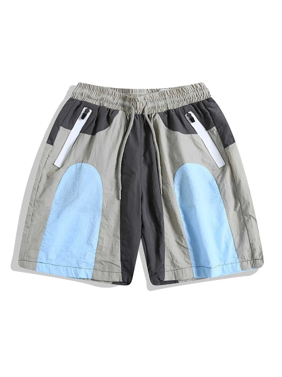 Blue loose-fit quick-drying beach shorts with elastic waistband shown flat