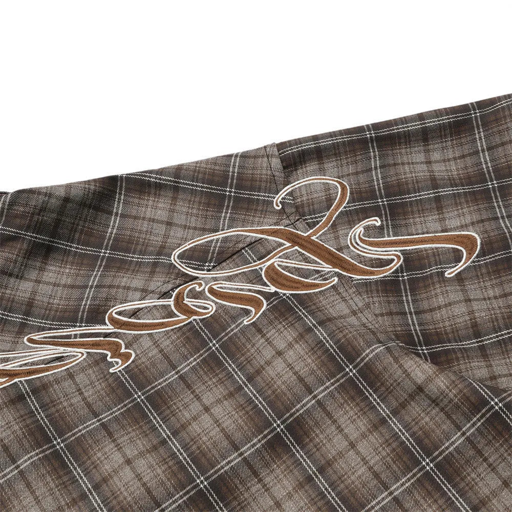 Men's black and brown plaid short sleeve shirt with embroidery detail and lapel collar