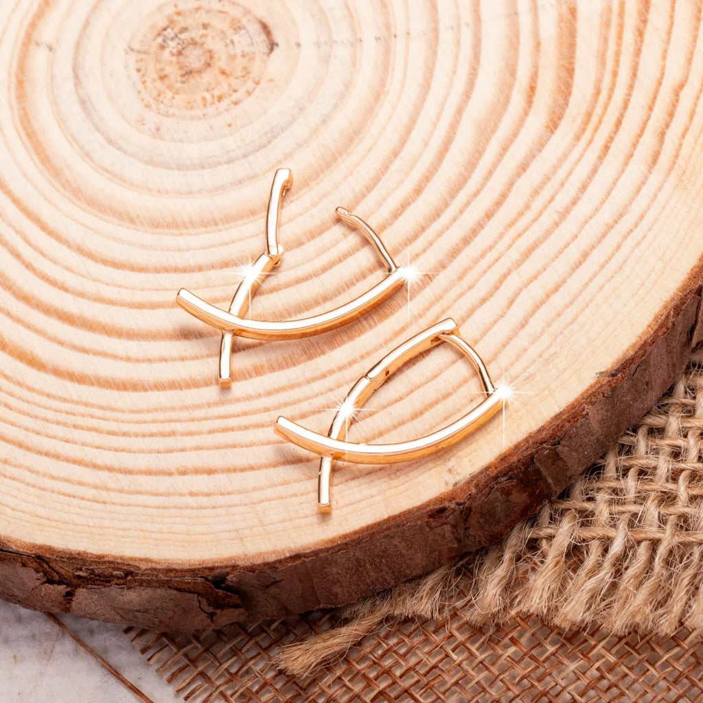 Rose gold cross shaped copper earrings with minimalist design and light luxury finish