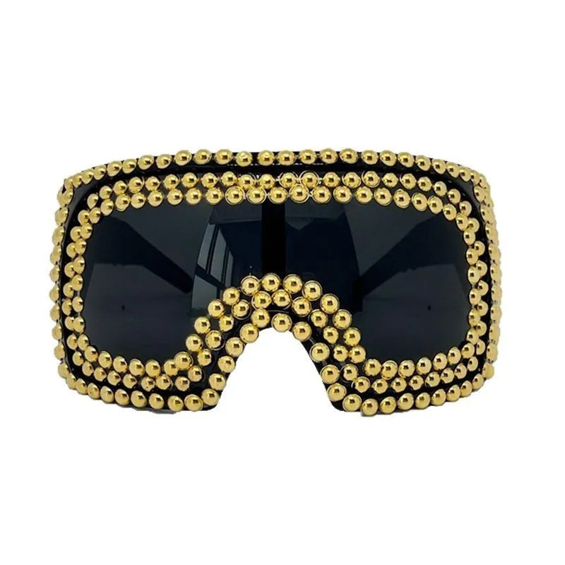 Men's punk style sunglasses with super large square frame and metal rivet details in gold colour