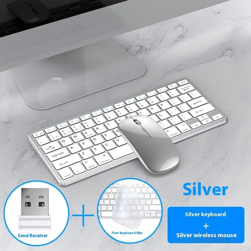 Black wireless ultra-thin keyboard and mouse combo with USB receiver and keyboard cover on a desk.