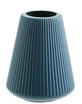Melamine plastic decorative flower vase in four colours on desktop