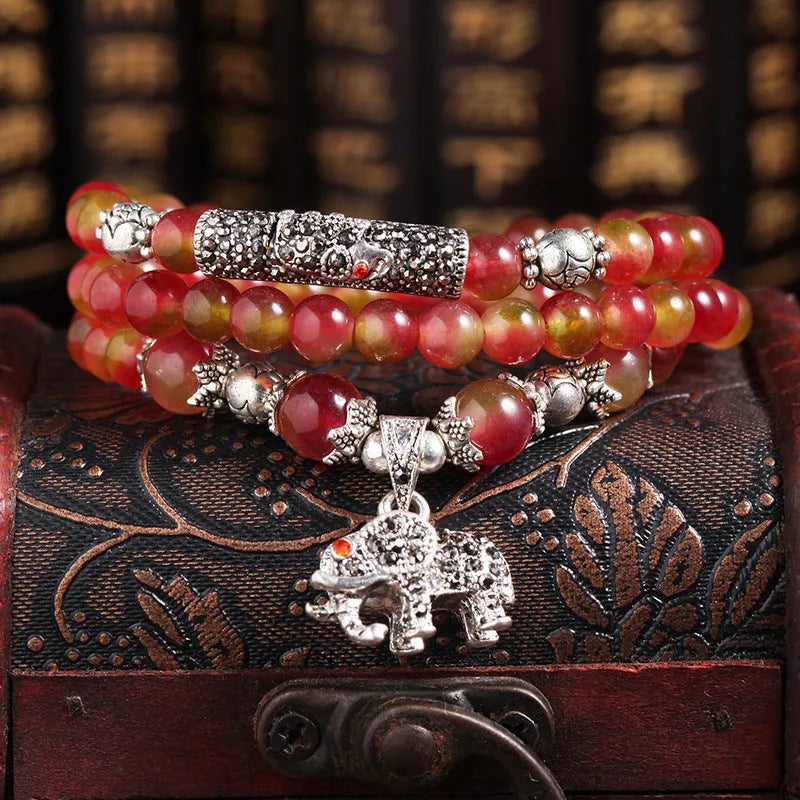 Handmade watermelon crystal bracelet with traditional Chinese knot design in geometric beads
